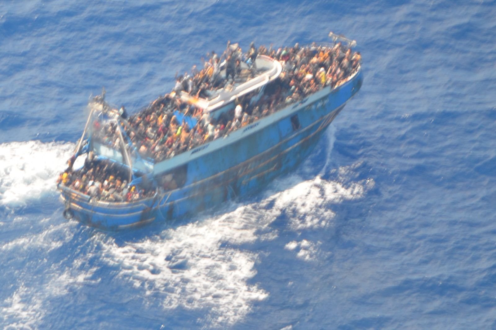 The boat carrying migrants before it sank, near Kalamata, Greece, on June 15. More than 600 people are believed to have died after the boat sank in international waters of the Ionian Sea. The Greek coast guard rescued more than 100 people and recovered more than 80 bodies. (Greek Coast Guard/Handout/Anadolu Agency via Getty Images)