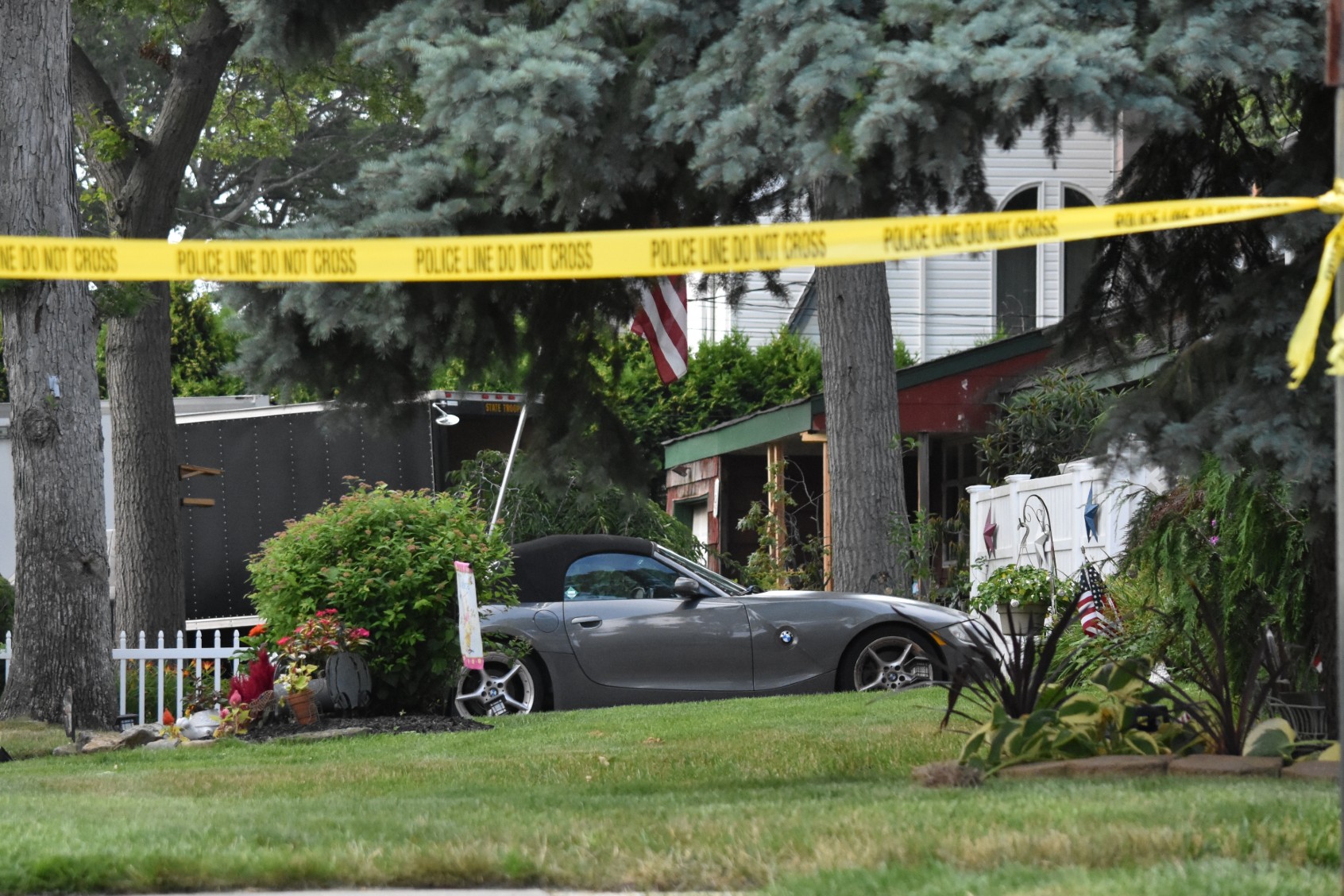 Crime scene investigators bring out evidence from the home of Rex Heuermann who was arrested as a suspect in the Gilgo Beach serial killings In Massapequa Park, Long Island, New York on July 14, 2023. (Kyle Mazza/Anadolu Agency via Getty Images)