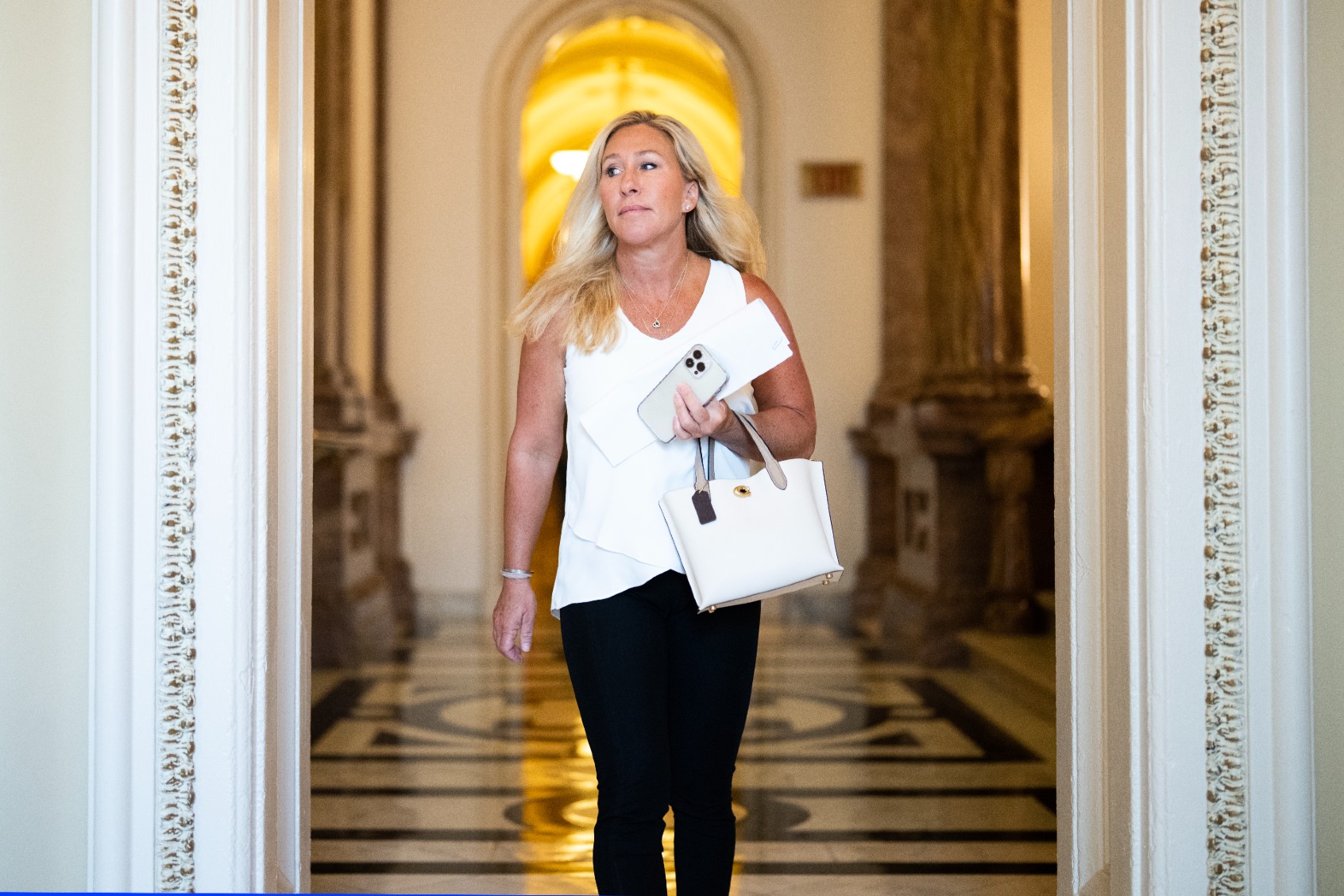 Rep. Marjorie Taylor Greene, R-Ga., is seen in the U.S. Capitol before the House passed the National Defense Authorization Act on Friday, July 14, 2023. (Tom Williams/CQ-Roll Call, Inc via Getty Images)