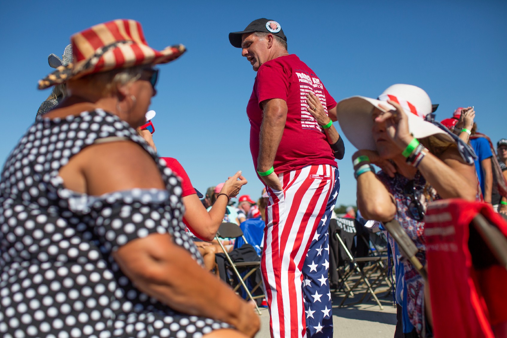 Michael Brian Protzman, also know as Negative48 and the supposed leader of a QAnon cult, talks with supporters before a rally for former President Donald Trump in Wilmington, North Carolina on September 23, 2022. (Madeline Gray for The Washington Post via Getty Images)