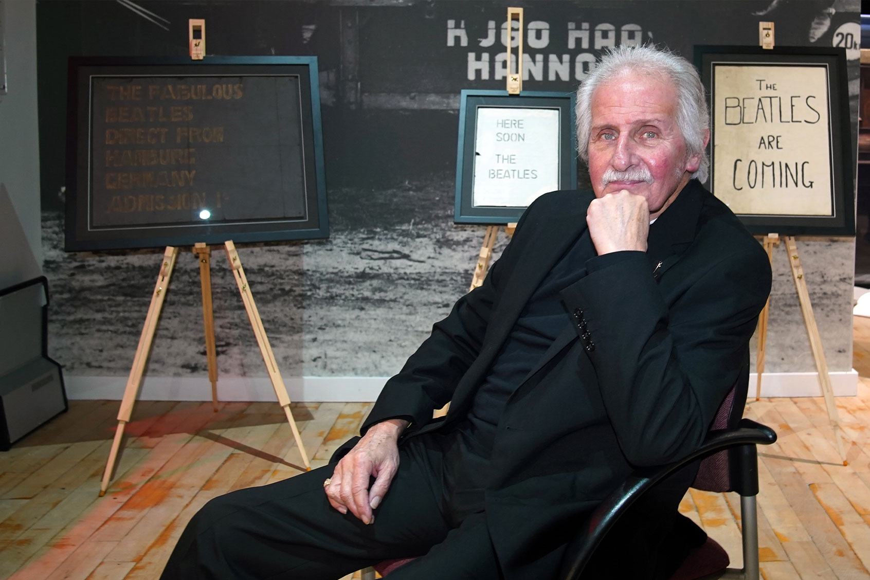 Former Beatles drummer Pete Best at the Beatles Museum in Liverpool, in front of posters used to advertise the Beatles playing live at the Casbah in Liverpool. (Peter Byrne/PA Images via Getty Images)