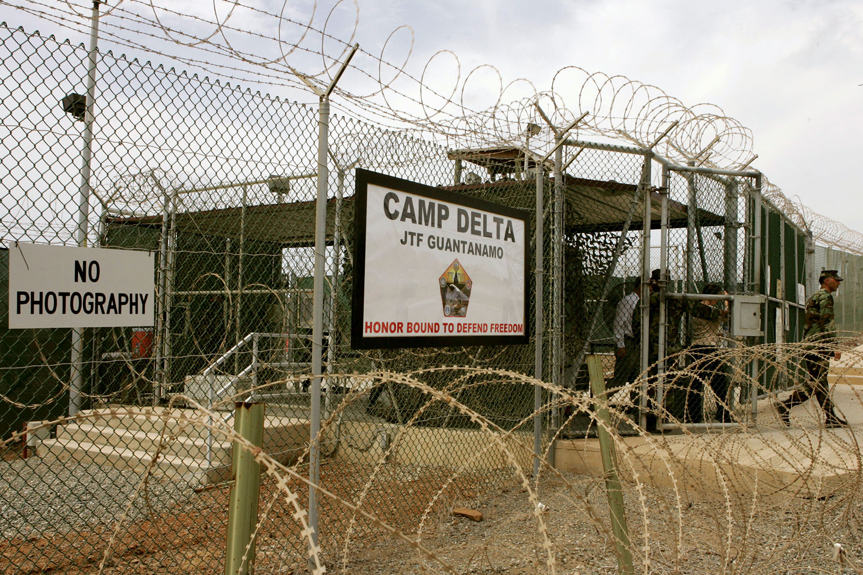 A Soldier walks through a gate at Camp Delta at Guantanamo Naval Base in Guantanamo, Cuba. (Mark Wilson/Getty Images)