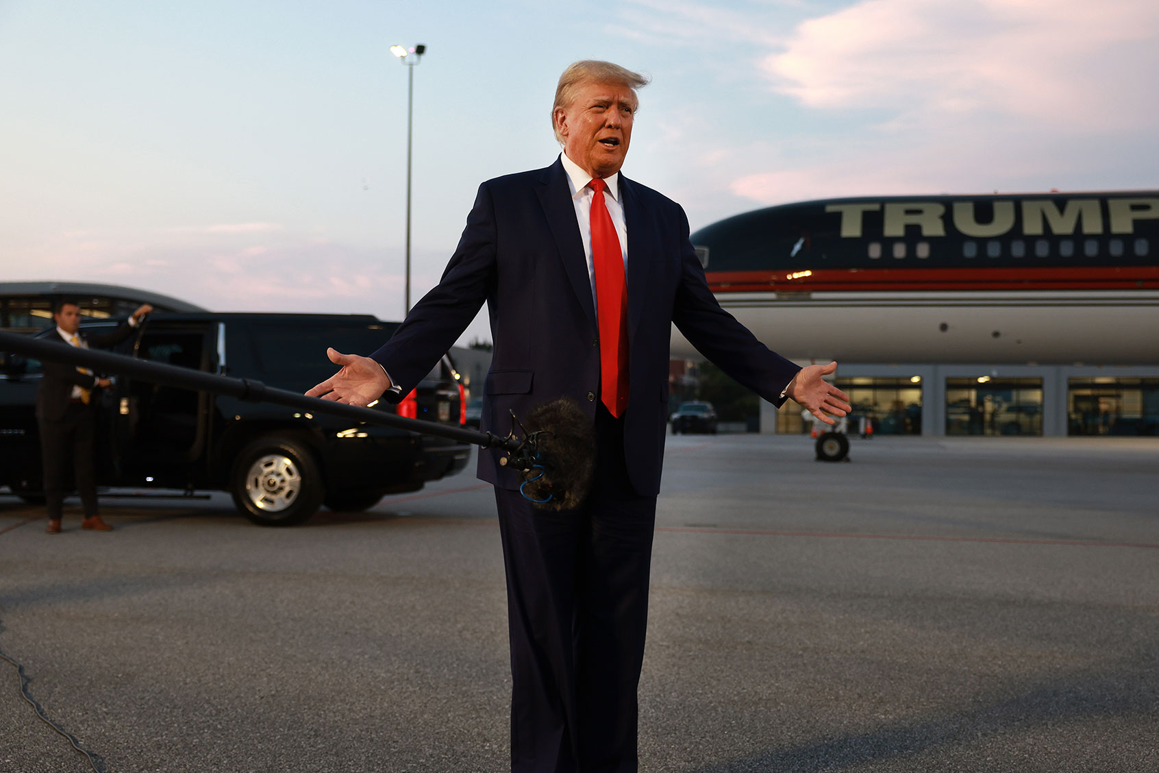 Former U.S. President Donald Trump speaks to the media at Atlanta Hartsfield-Jackson International Airport after being booked at the Fulton County jail on August 24, 2023 in Atlanta, Georgia. (Joe Raedle/Getty Images)