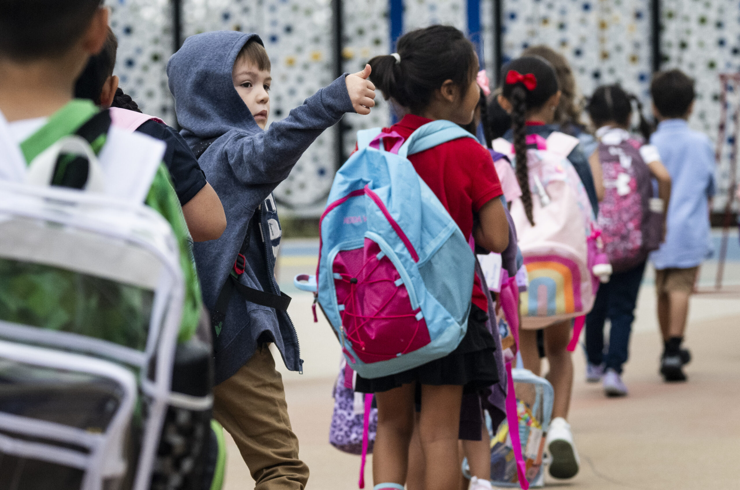 Kindergarten students head to the first day of class at Roosevelt Elementary School in Anaheim, California, Aug. 10, 2023. (Paul Bersebach/MediaNews Group/Orange County Register via Getty Images)