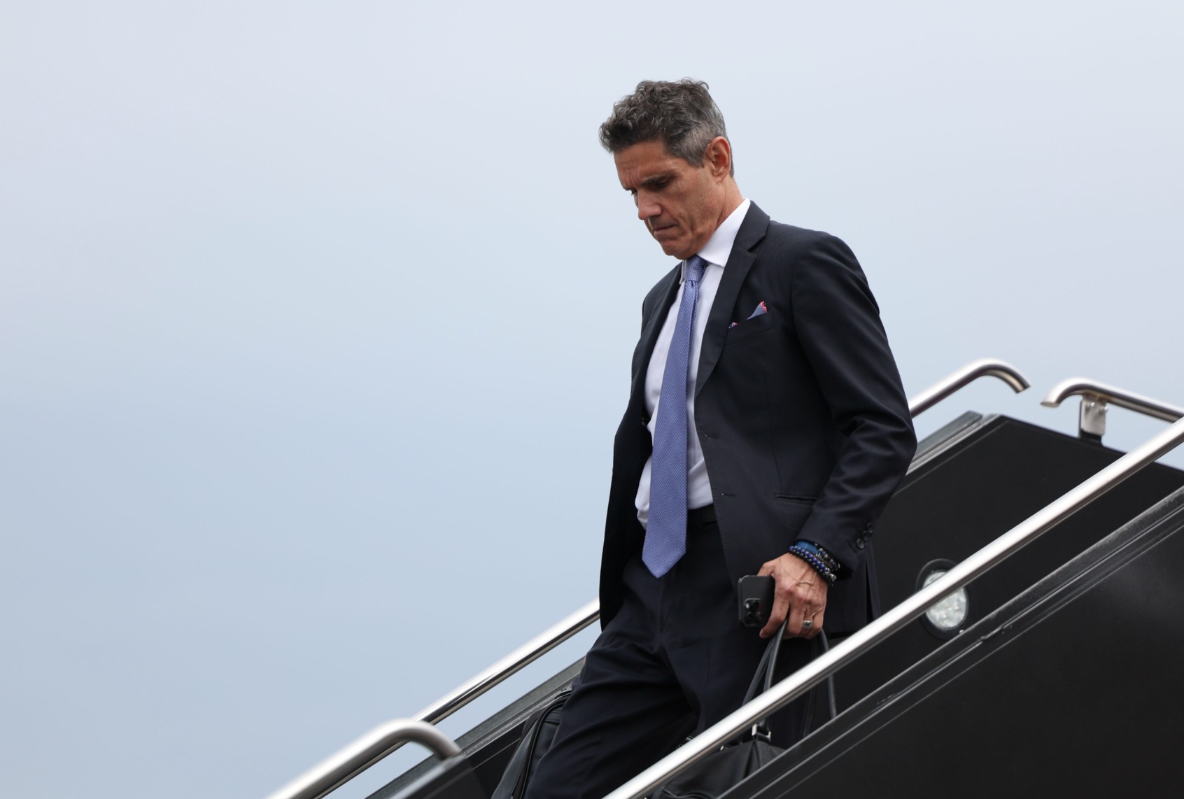 Lawyer John Lauro arrives with former president Donald Trump at Ronald Reagan Washington National Airport in Arlington, Va. on Thursday, August 3, 2023. ( Tom Brenner for The Washington Post via Getty Images)