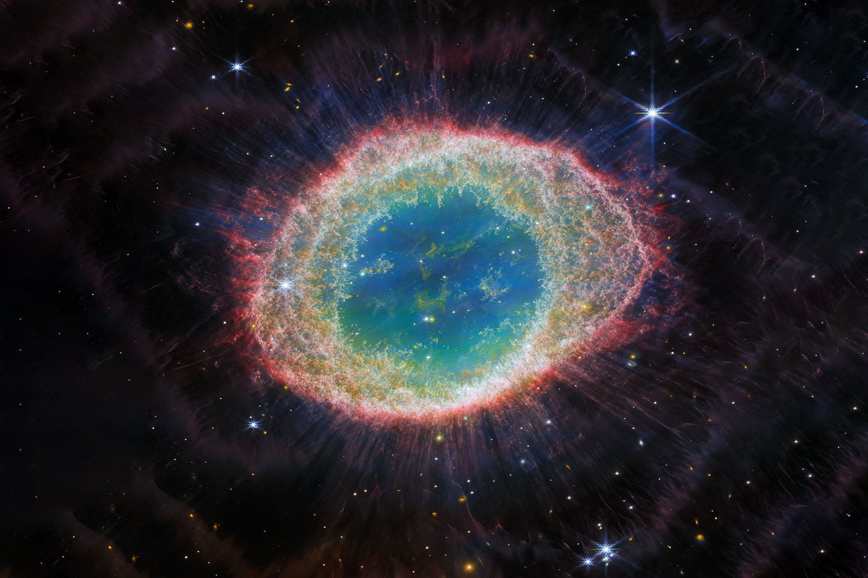 Formed by a star throwing off its outer layers as it runs out of fuel, the Ring Nebula is an archetypal planetary nebula. Also known as M57 and NGC 6720, it is relatively close to Earth at roughly 2,500 light-years away. (ESA/Webb, NASA, CSA, M. Barlow (UCL), N. Cox (ACRI-ST), R. Wesson (Cardiff University))