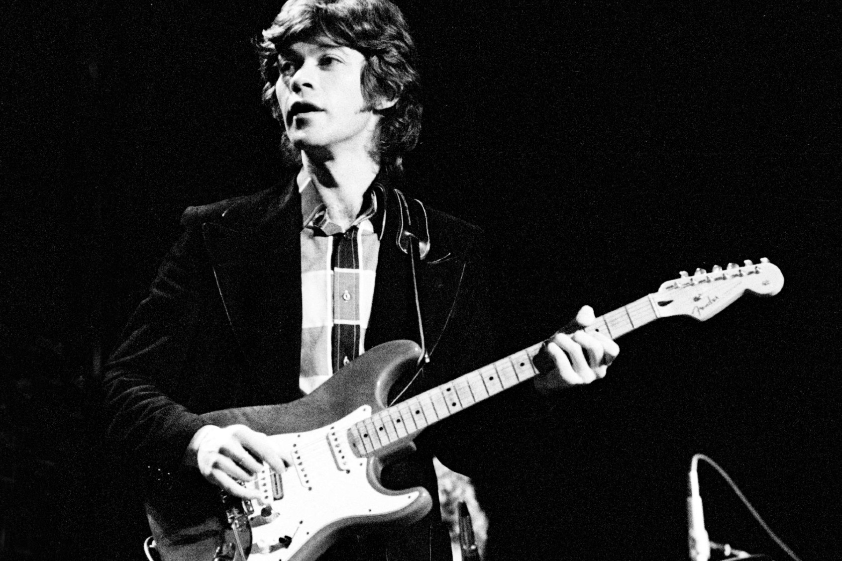 Robbie Robertson from The Band performs live on stage in Rotterdam, Netherlands in 1971 (Gijsbert Hanekroot/Redferns)