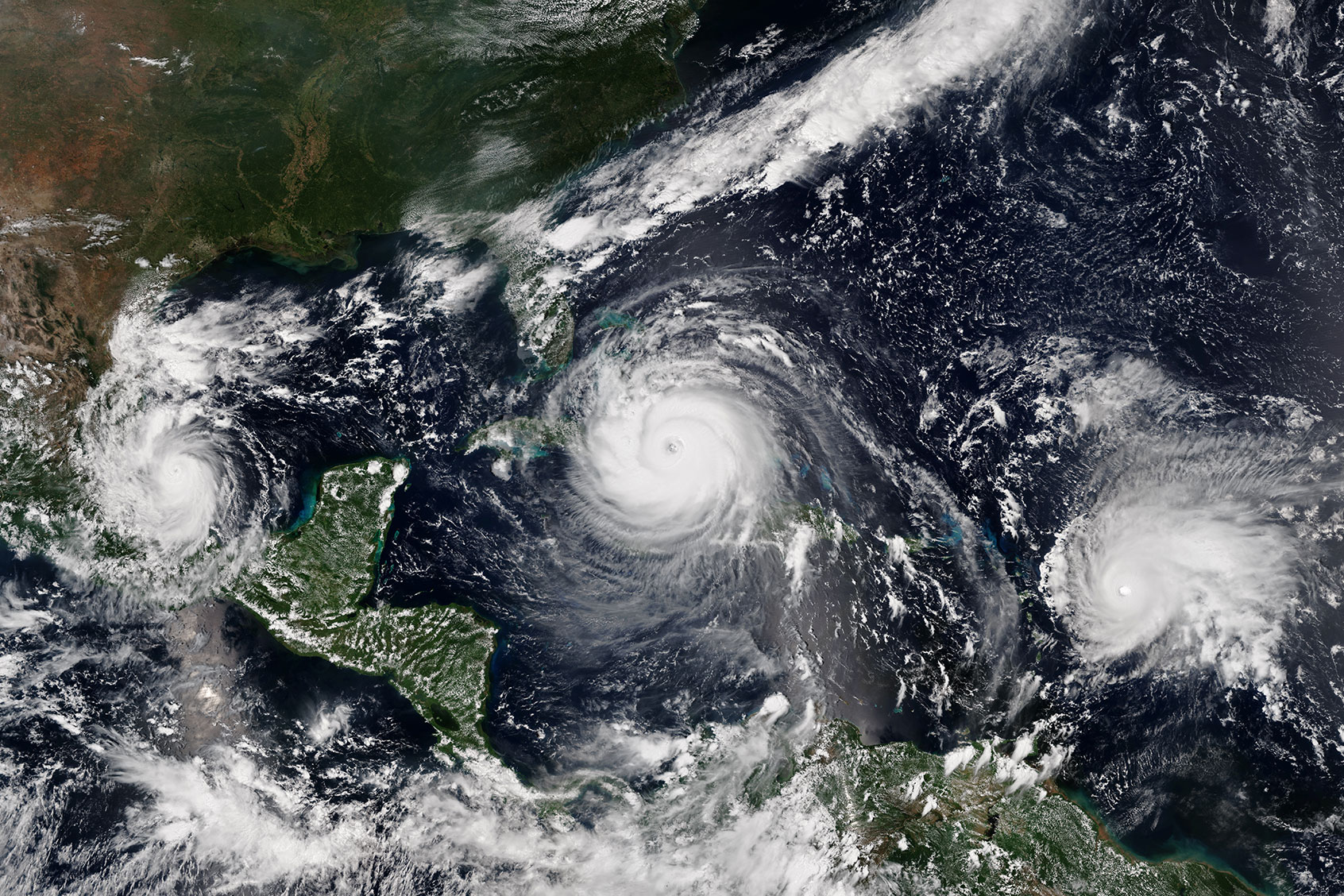Satellite image of Hurricane Katia (left) making landfall over the Mexican state of Veracruz, Hurricane Irma (center) approaching Cuba, and Hurricane Jose reaching peak intensity on September 8, 2017. (HUM Images/Universal Images Group via Getty Images)
