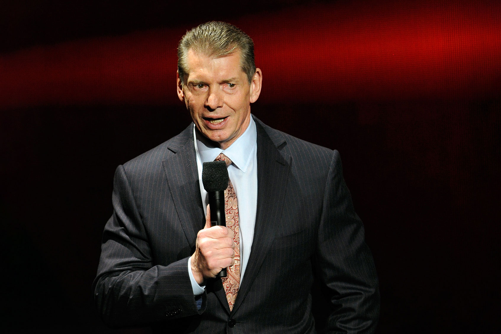 WWE Chairman and CEO Vince McMahon speaks at a news conference announcing the WWE Network at the 2014 International CES at the Encore Theater at Wynn Las Vegas on January 8, 2014 in Las Vegas, Nevada. (Ethan Miller/Getty Images)