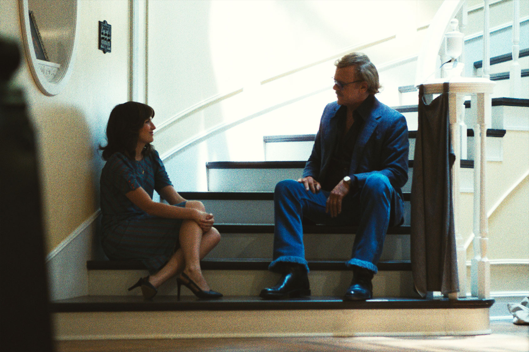 Hadley Robinson and John C. Reilly in "Winning Time: The Rise of the Lakers Dynasty" (Warrick Page/HBO)