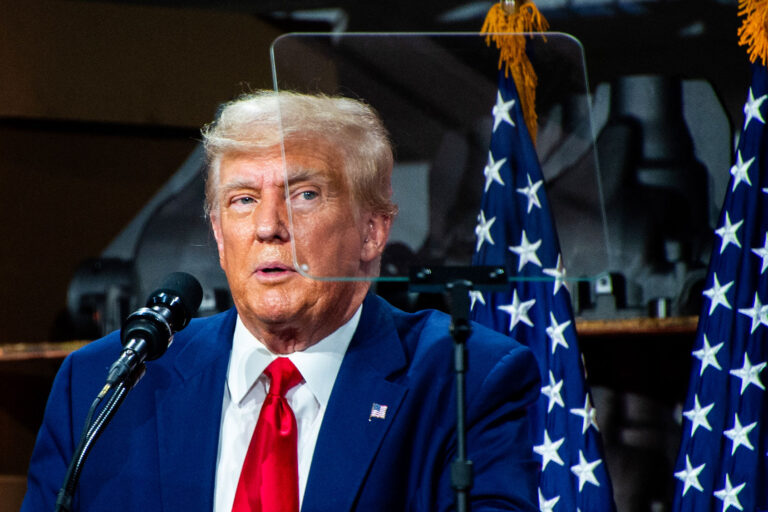 Former US President and 2024 presidential hopeful Donald Trump speaks at Drake Enterprises, an automotive parts manufacturer and supplier, in Clinton, Michigan, on September 27, 2023. (MATTHEW HATCHER/AFP via Getty Images)