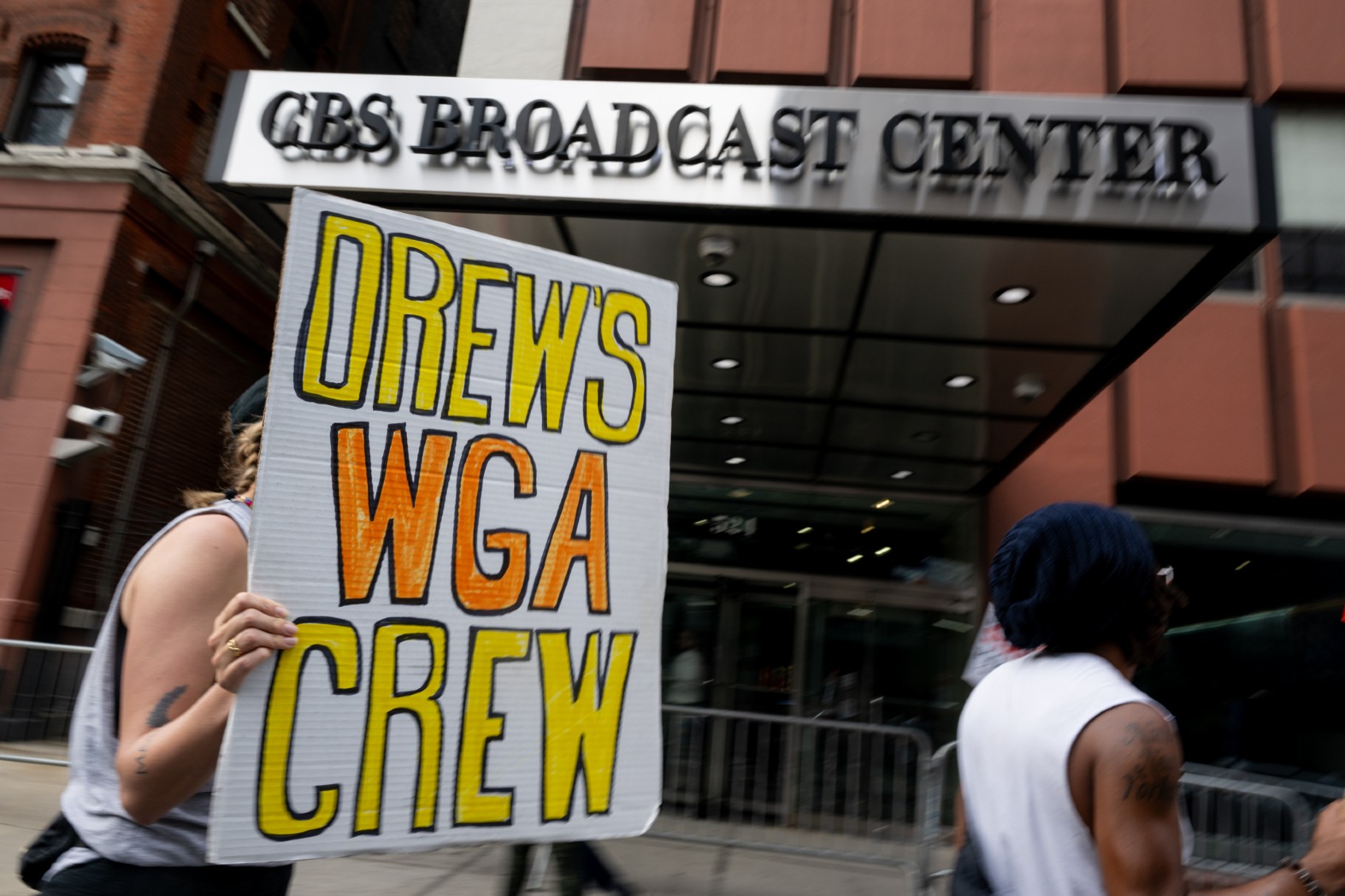 Members of the WGA-EAST and SAG-AFTRA picket outside of The Drew Barrymore Show as audience members arrive ahead of the show at CBS Broadcast Center on September 12, 2023 in New York City. (Alexi Rosenfeld/Getty Images)