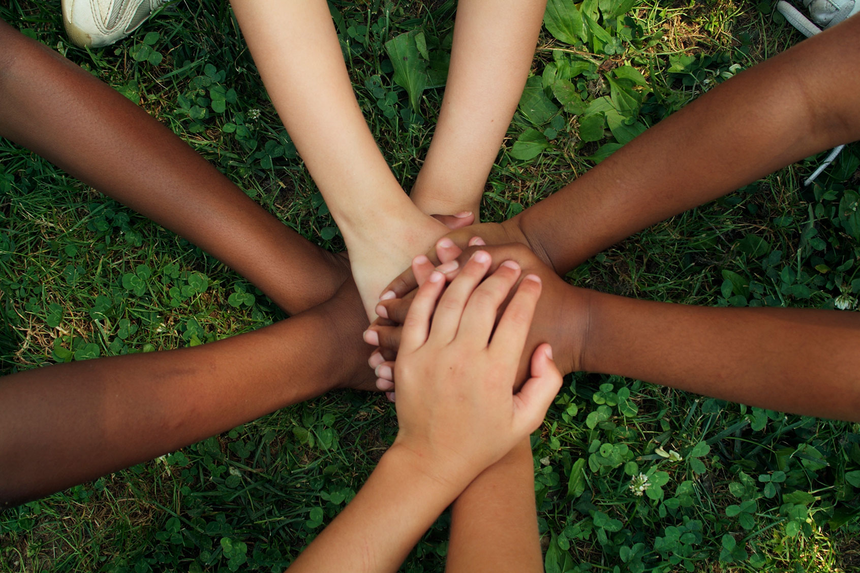 Hands of Children Playing (Getty Images/Richard T. Nowitz)
