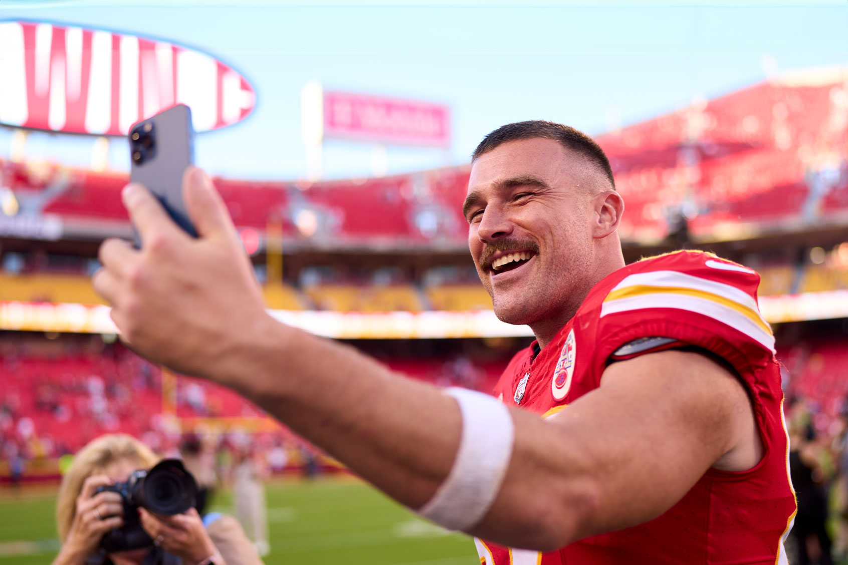Travis Kelce #87 of the Kansas City Chiefs celebrates after defeating the Chicago Bears at GEHA Field at Arrowhead Stadium on September 24, 2023 in Kansas City, Missouri. (Cooper Neill/Getty Images)