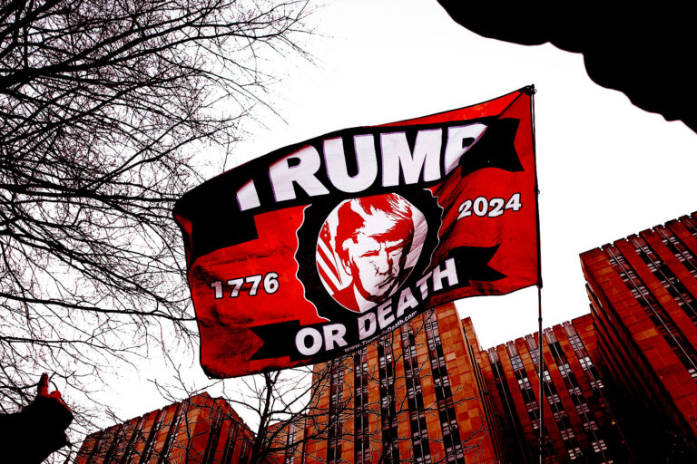Supporters of former U.S. President Donald Trump gather outside the courthouse where Trump will have his arraignment on April 4, 2023 in New York City. (Drew Angerer/Getty Images)