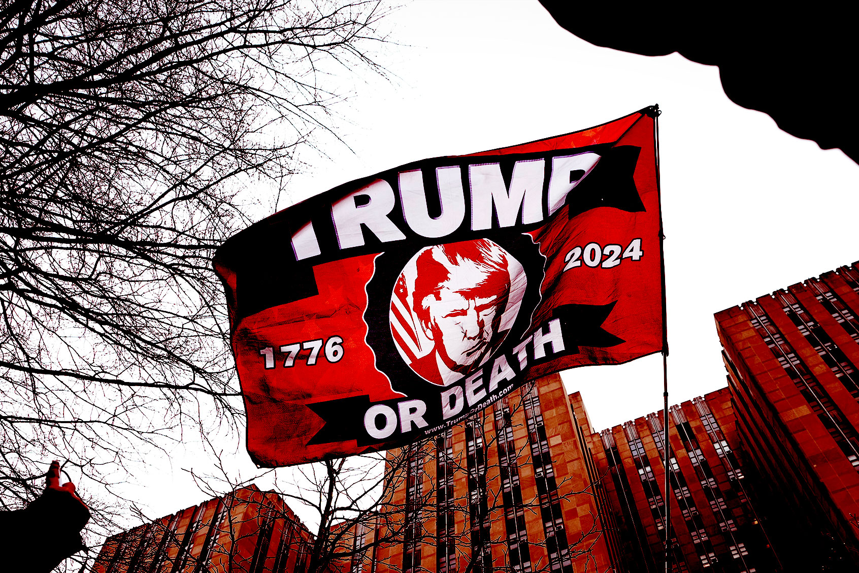 Supporters of former U.S. President Donald Trump gather outside the courthouse where Trump will have his arraignment on April 4, 2023 in New York City. (Drew Angerer/Getty Images)