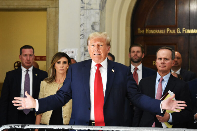 Former President of the United States Donald J. Trump appears in the hallway of the courthouse to speak to the press on day three of the civil fraud trial in Manhattan, New York, United States on October 4, 2023. (Kyle Mazza/Anadolu Agency via Getty Images)