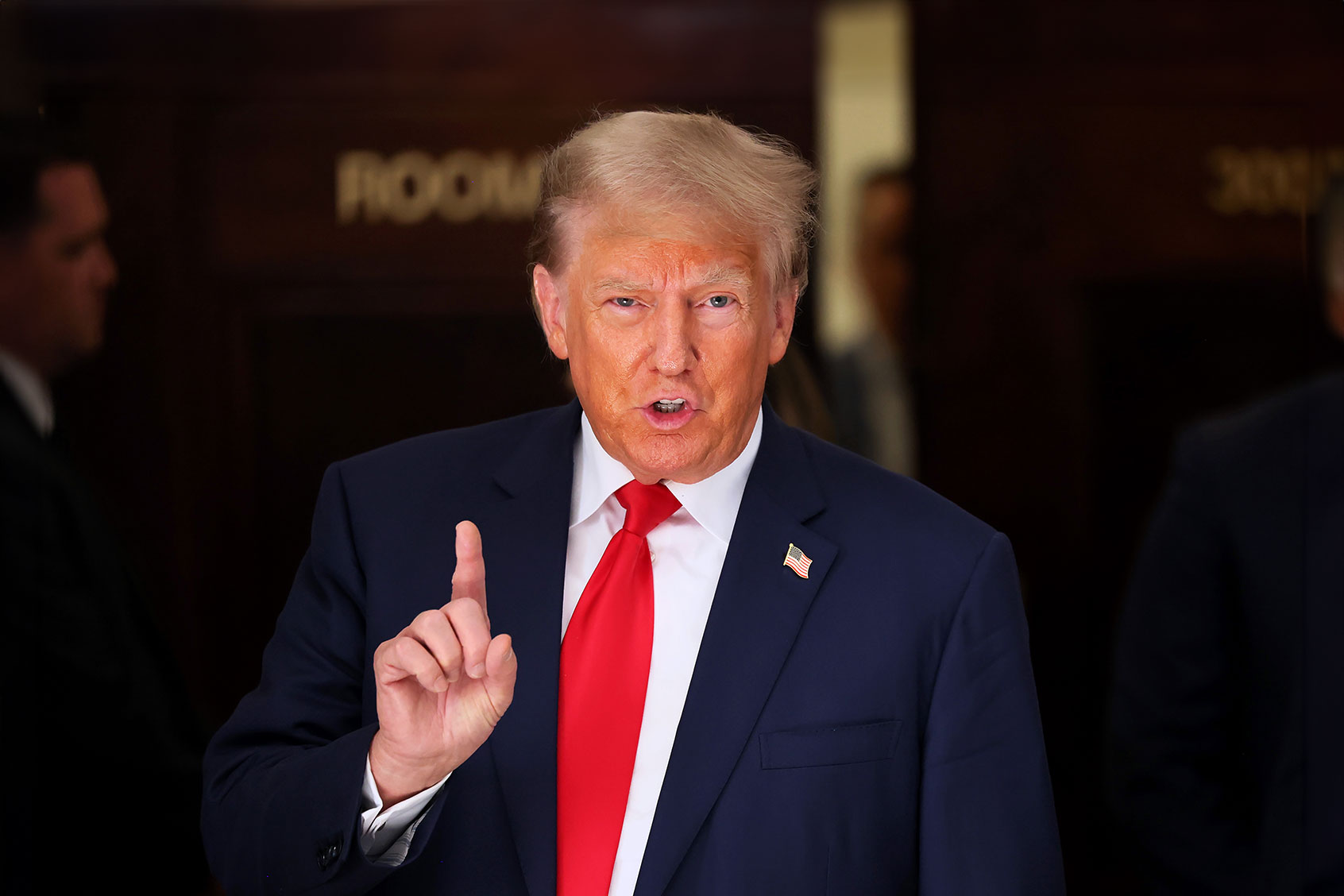 Former President Donald Trump speaks as he leaves the courtroom for a lunch recess during the second day of his civil fraud trial at New York State Supreme Court on October 03, 2023 in New York City. (Michael M. Santiago/Getty Images)