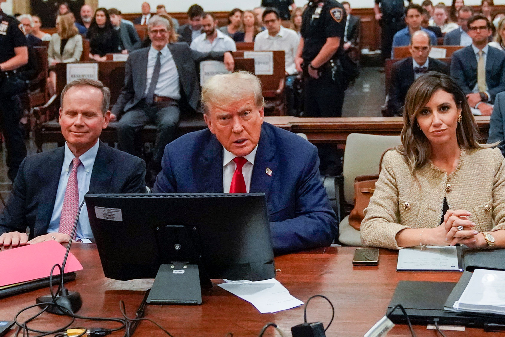 Former U.S. President Donald Trump appears in the courtroom with his attorneys Christopher M. Kise and Alina Habba for the third day of his civil fraud trial at New York State Supreme Court on October 04, 2023 in New York City. (Mary Altafeer-Pool/Getty Images)