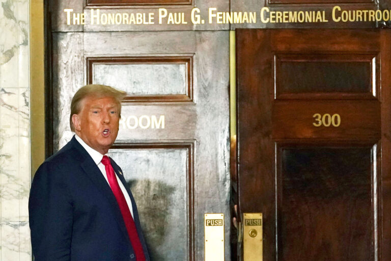 Former President Donald Trump speaks to the press as he returns to court after a break in his $250 million civil fraud trial against him and his company October 17, 2023. Trump attends the trial a day after a federal judge, in a separate criminal case, imposed a partial gag order on Trump, on October 16. (TIMOTHY A. CLARY/AFP via Getty Images)