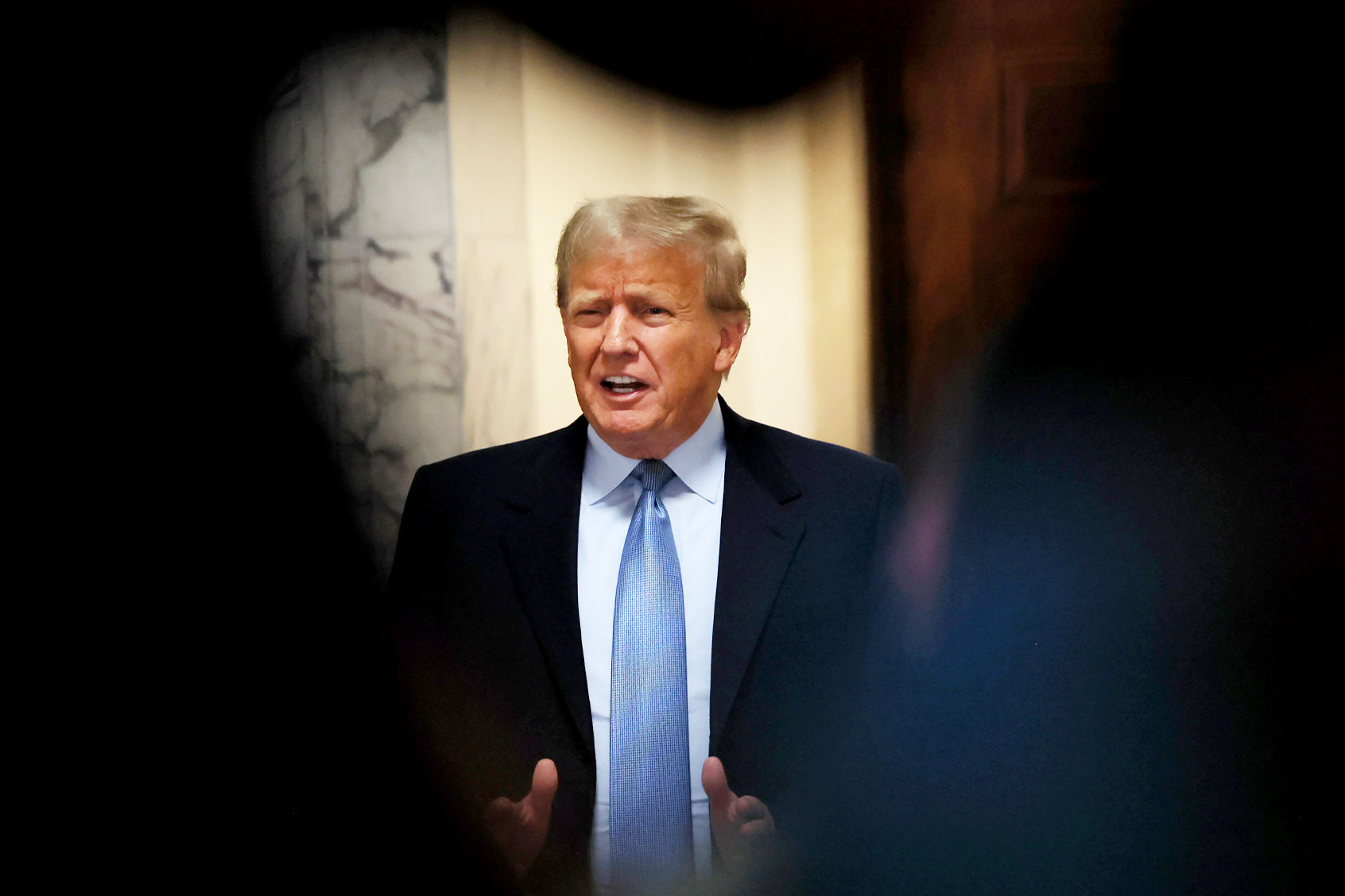 Former President Donald Trump speaks to the media as he leaves the courtroom during his civil fraud trial at New York State Supreme Court on October 18, 2023 in New York City. (Michael M. Santiago/Getty Images)