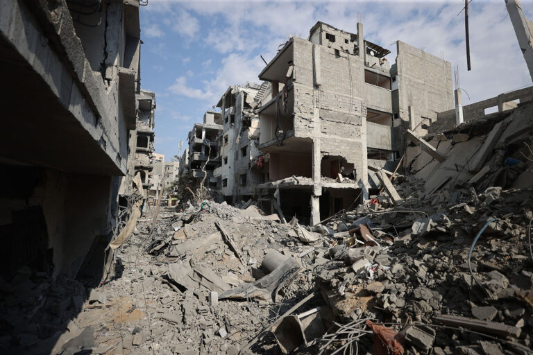 Palestinians look for their belongings among the rubble of their destroyed houses as Israeli attacks continue on the 10th day in Gaza City, Gaza on October 16, 2023. (Mustafa Hassona/Anadolu via Getty Images)