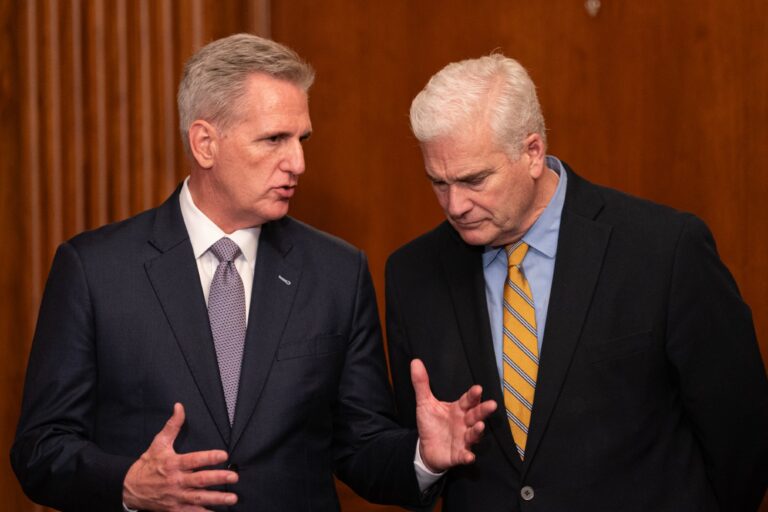 Kevin McCarthy (L) (R-CA) speaks with Majority Whip Rep. Tom Emmer (R-MN) following passage in the House of a 45-day continuing resolution on September 30, 2023 in Washington, DC. (Nathan Howard/Getty Images)
