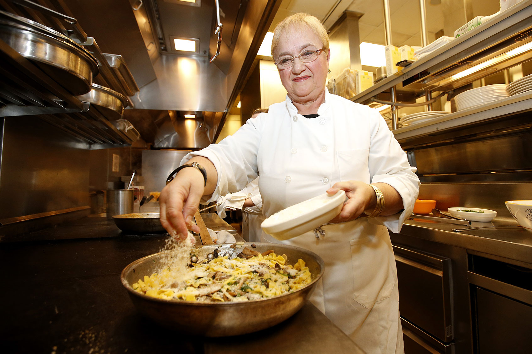 Chef Lidia Bastianich prepares food before the start of the NASCAR Evening Series Presented by Bank of America at Carnevino at The Palazzo Las Vegas on December 4, 2013 in Las Vegas, Nevada. (Chris Graythen/NASCAR via Getty Images)