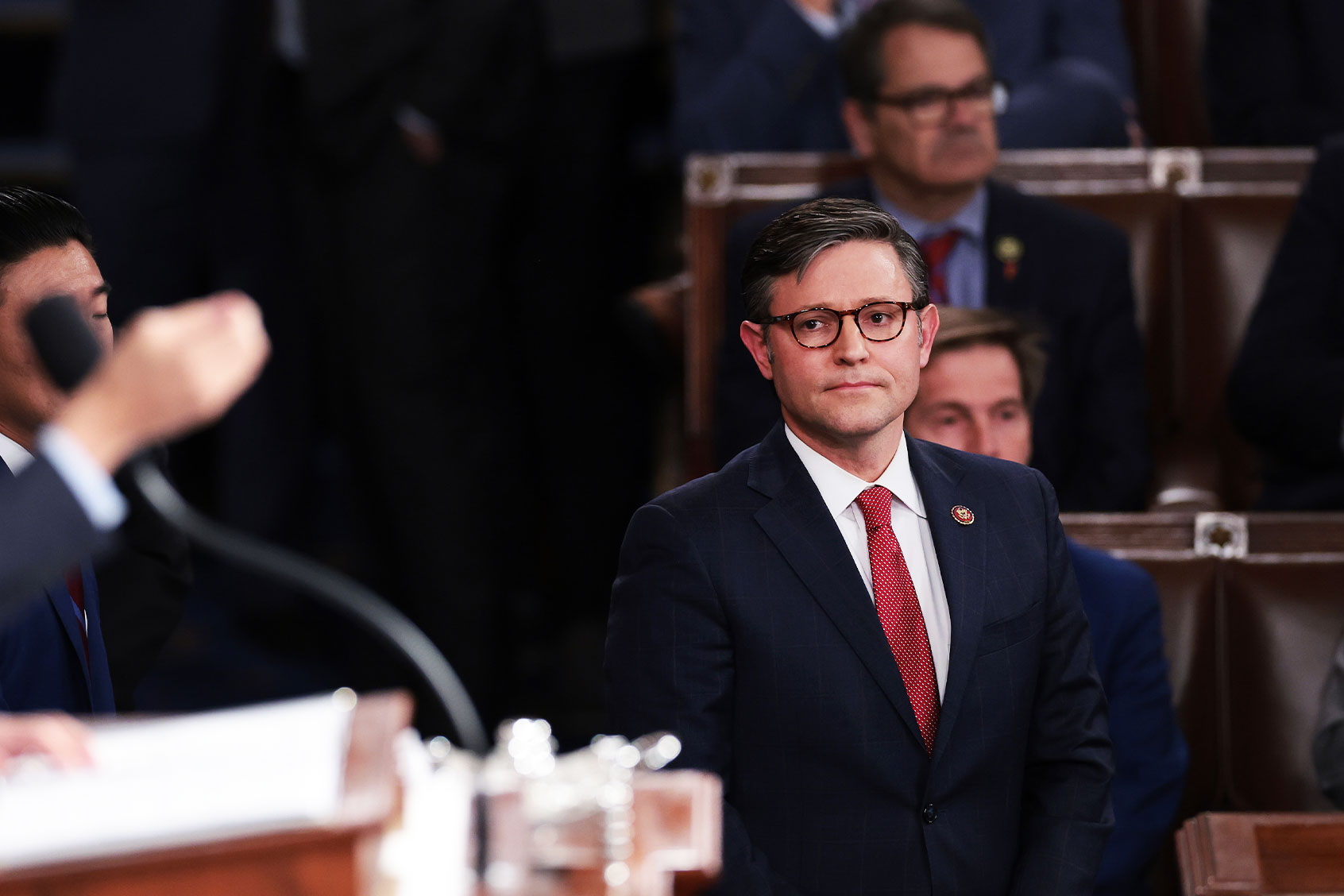 U.S. Rep. Mike Johnson (R-LA) watches as House Minority Leader Hakeem Jeffries (D-NY) delivers remarks after Johnson was elected as the new Speaker of the House at the U.S. Capitol on October 25, 2023 in Washington, DC. (Win McNamee/Getty Images)