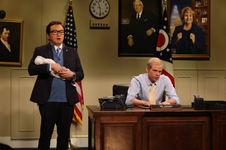 Bowen Yang as George Santos and Mikey Day as Jim Jordan during the “Jim Jordan” Cold Open on Saturday, October 21, 2023 (Will Heath/NBC)