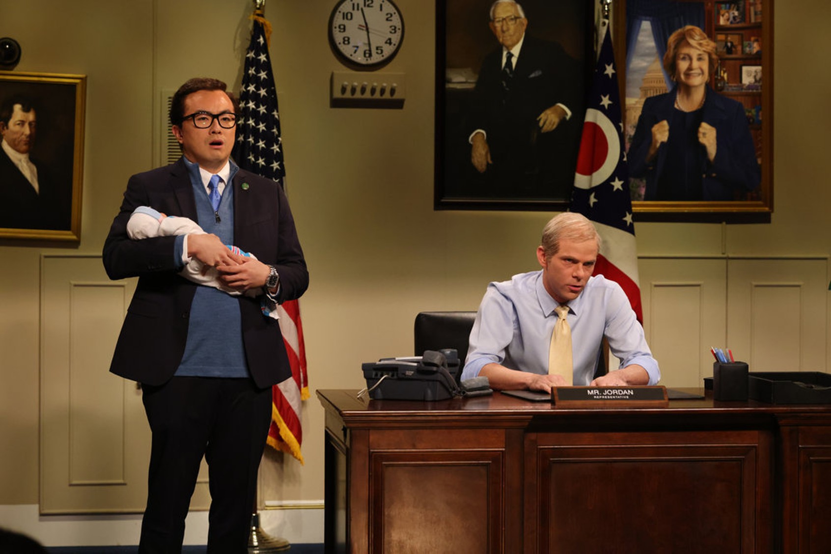 Bowen Yang as George Santos and Mikey Day as Jim Jordan during the “Jim Jordan” Cold Open on Saturday, October 21, 2023 (Will Heath/NBC)