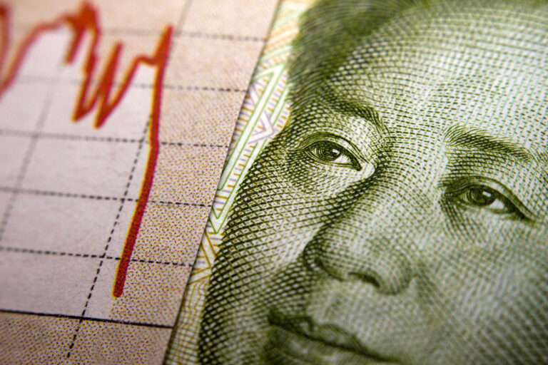 Stock Market Graph and Chinese banknote, closeup (Getty Images/claffra)