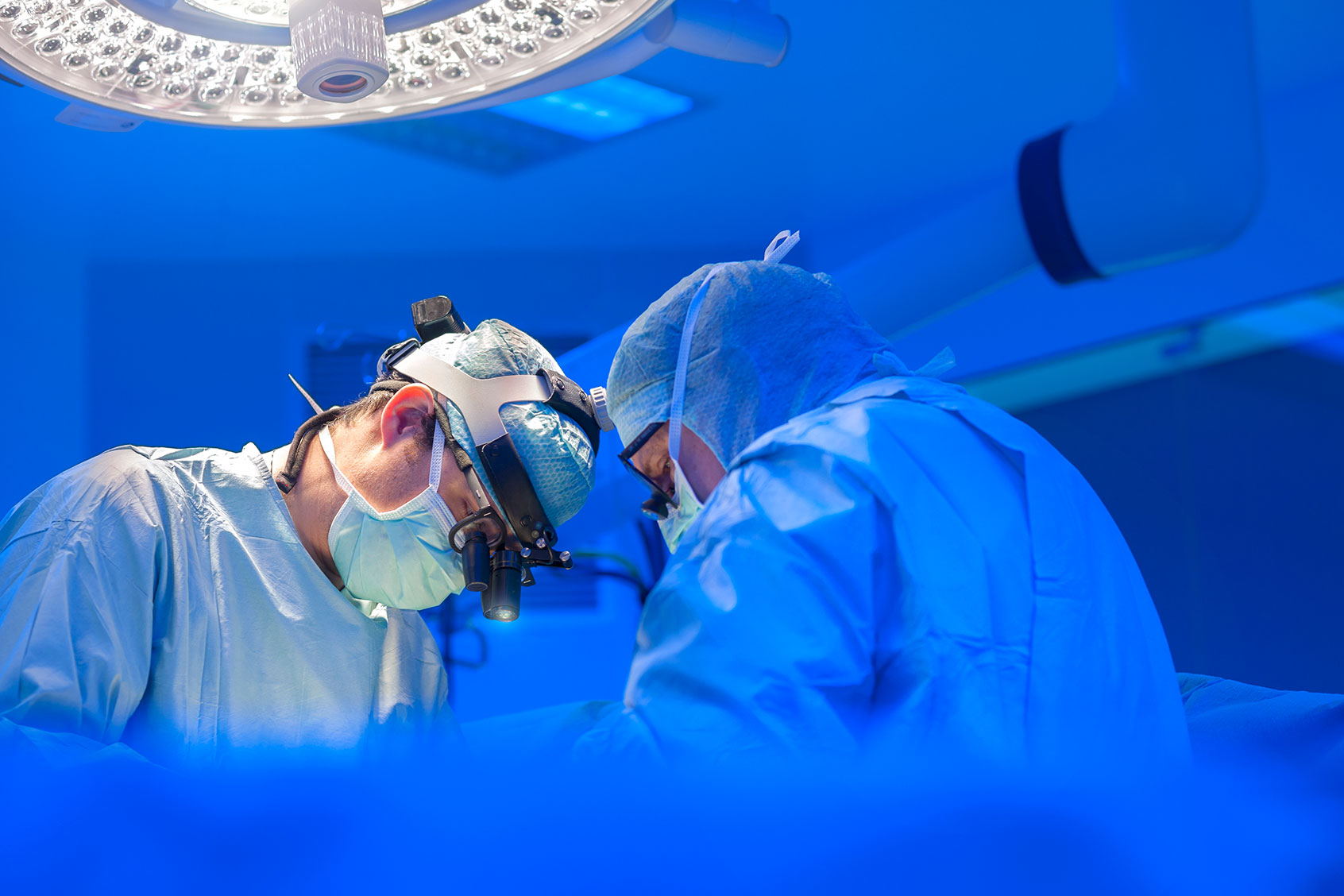 Surgeons performing open heart surgery (Getty Images/Thierry Dosogne)