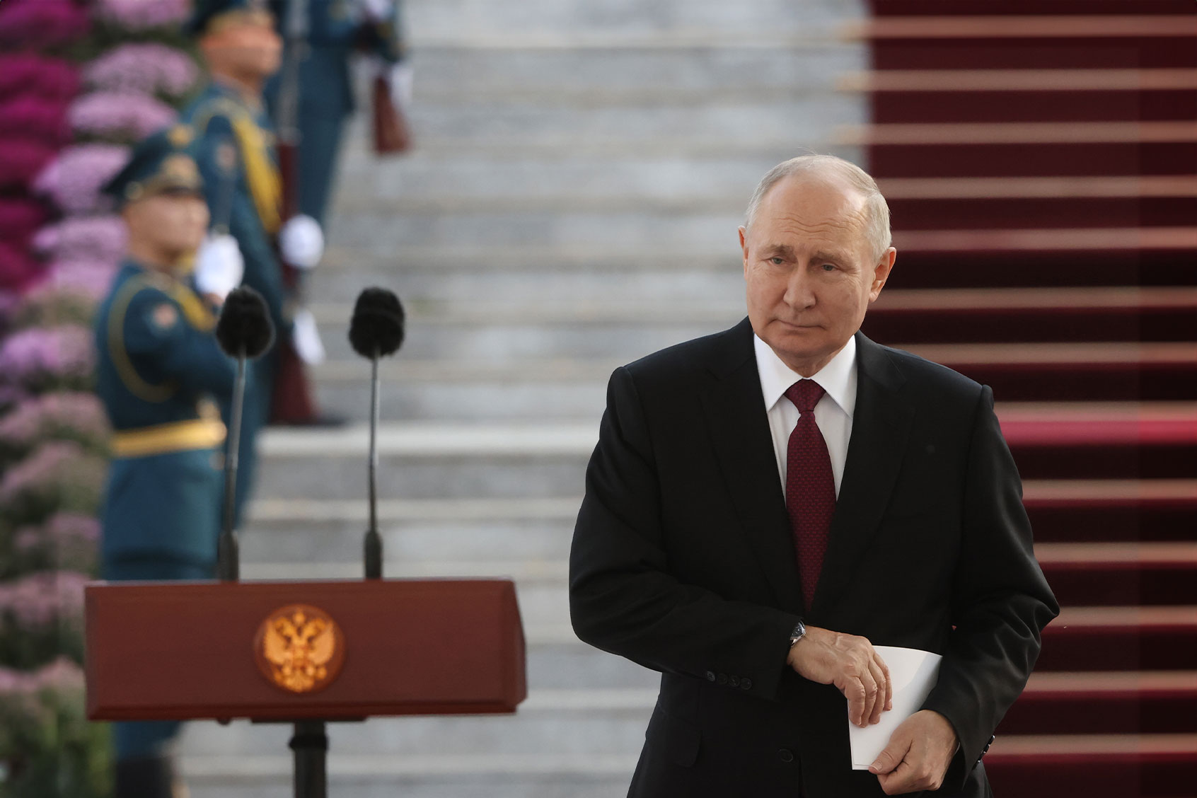 Russian President Vladimir Putin smiles during a meeting with military personnel of Russian Air Forces Base of Kant at the Ala-Archa State Residence on October 12, 2023, in Bishkek, Kyrgyzstan. (Contributor/Getty Images)
