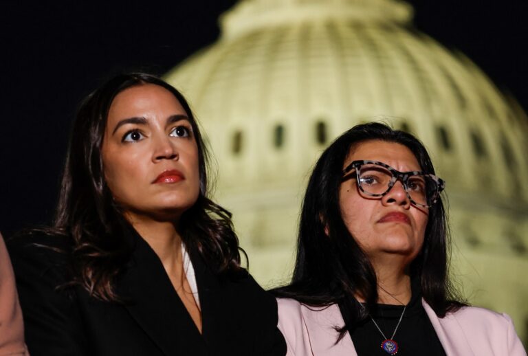 Rep. Alexandria Ocasio-Cortez (D-NY), and Rep. Rashida Tlaib (D-MI) listen during a news conference calling for a ceasefire in Gaza outside the U.S. Capitol building on November 13, 2023 in Washington, DC. (Anna Moneymaker/Getty Images)