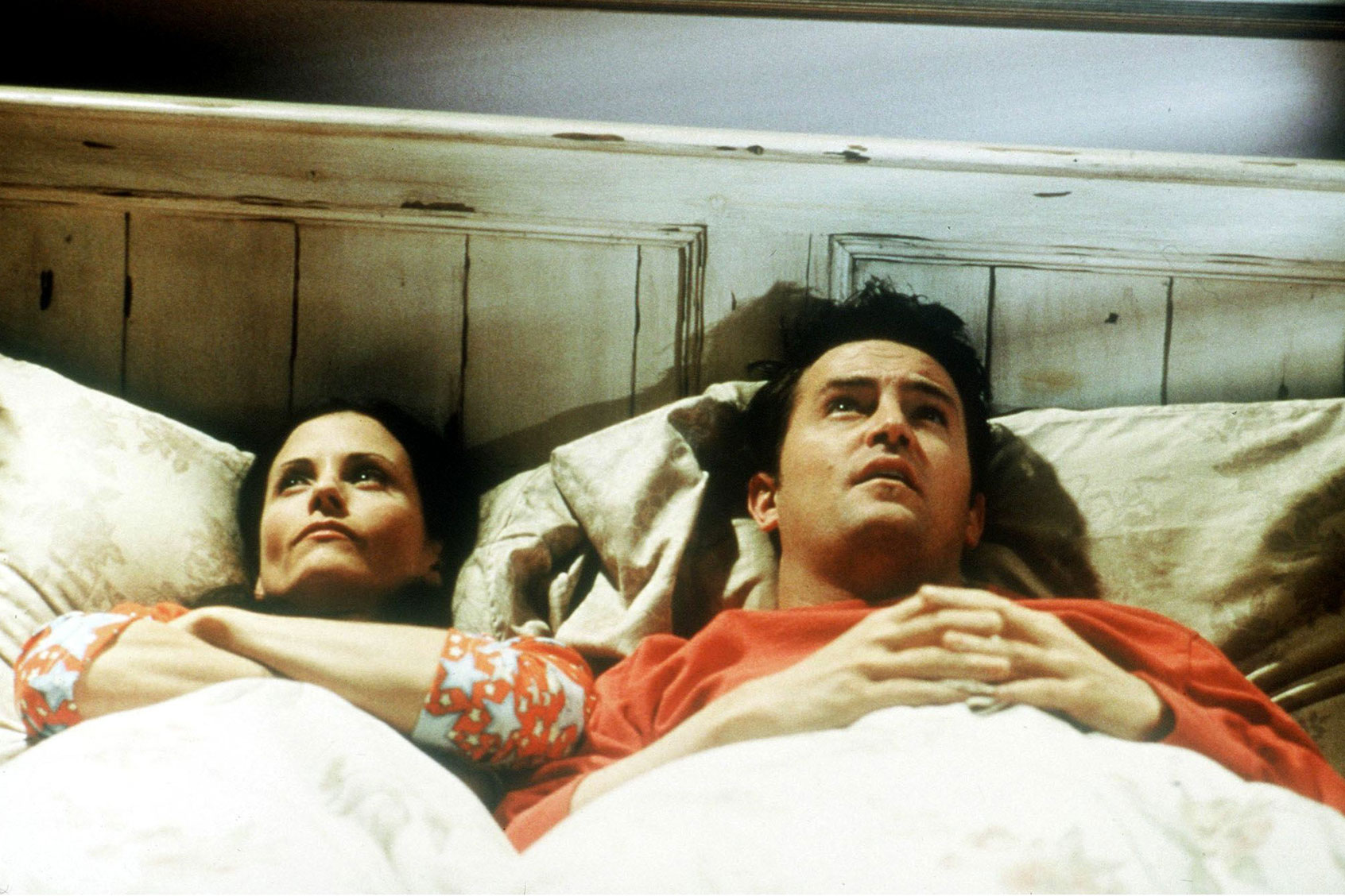 Courteney Cox Arquette and Matthew Perry star in Friends during the Year 6. (Courtesy of Warner Bros/Getty Images)