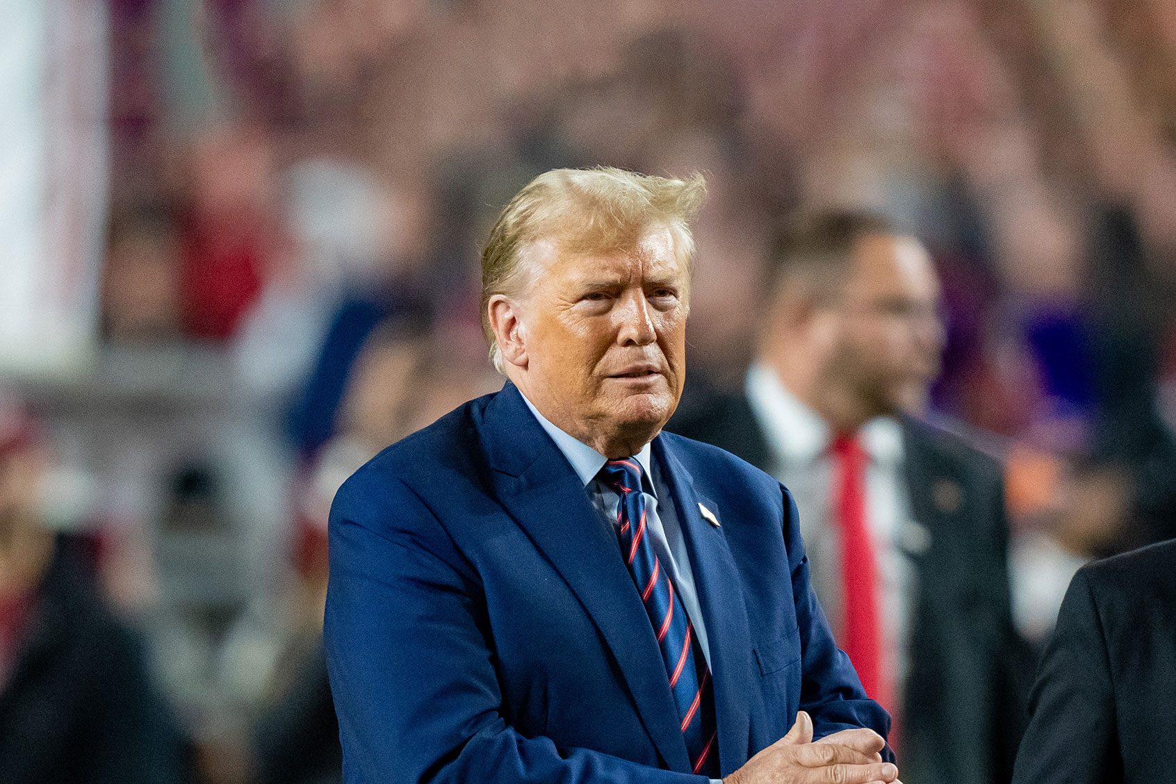 South Carolina governor Henry McMaster and former U.S. President Donald Trump make an appearance on the field at halftime during the game between the South Carolina Gamecocks and the Clemson Tigers at Williams-Brice Stadium on November 25, 2023 in Columbia, South Carolina. (Jacob Kupferman/Getty Images)