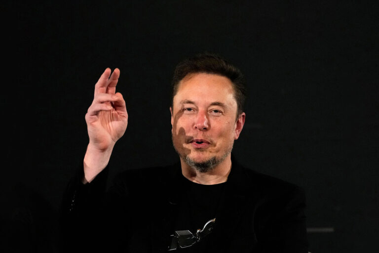 X (formerly Twitter) CEO Elon Musk gestures during an in-conversation event with Britain's Prime Minister Rishi Sunak in London on November 2, 2023. (KIRSTY WIGGLESWORTH/POOL/AFP via Getty Images)
