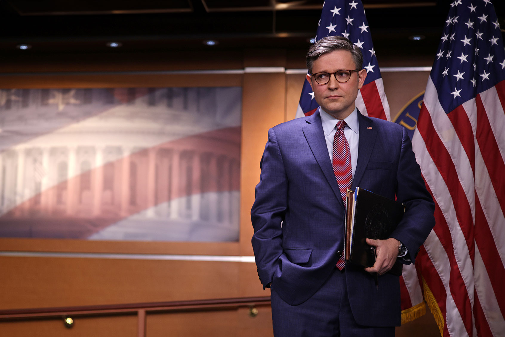 U.S. Speaker of the House Rep. Mike Johnson (R-LA) listens as he waits for his turn to speak during a news briefing at the U.S. Capitol on November 2, 2023 in Washington, DC. (Alex Wong/Getty Images)