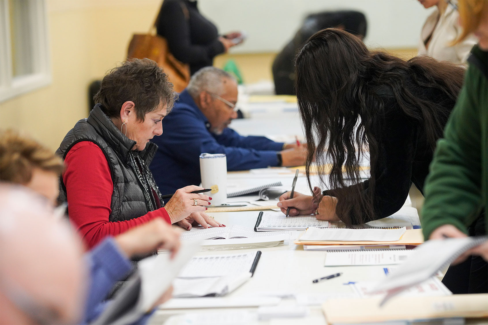 Voters check-in at a polling location on November 7, 2023 in Columbus, Ohio. (Andrew Spear/Getty Images)