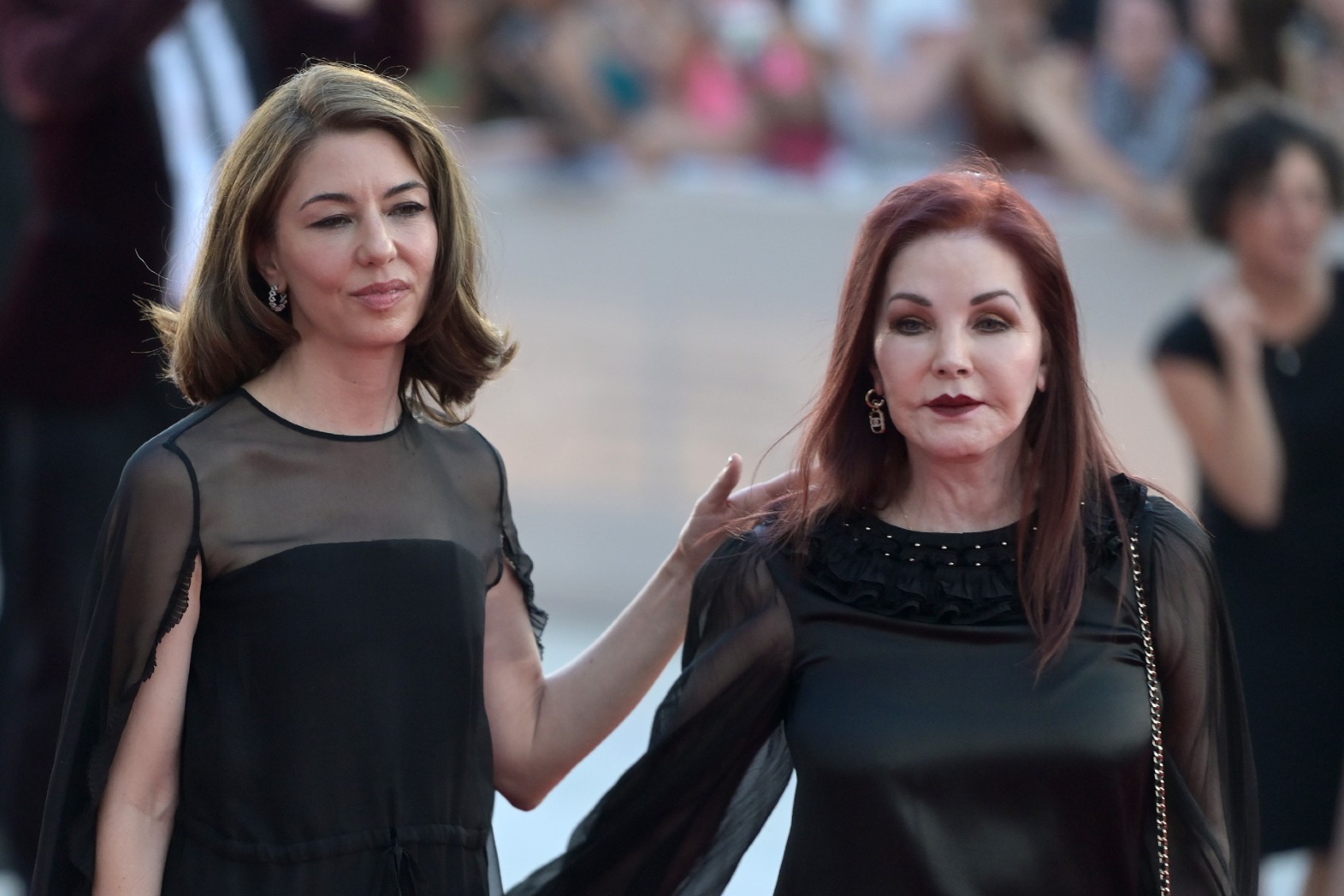 Priscilla Presley and director Sofia Coppola arrive on the red carpet at the premiere of the film "Priscilla" at the Venice International Film Festival. (Stefanie Rex/picture alliance via Getty Images)