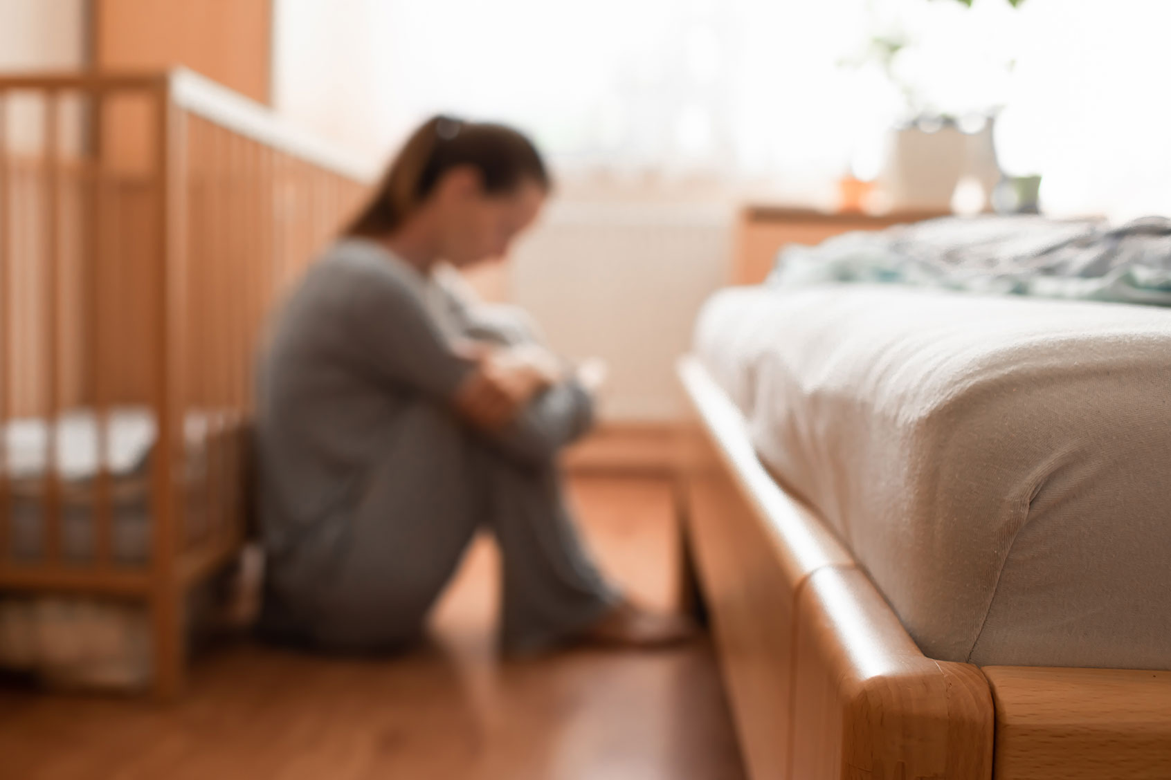 Tired stressed new mother at home (Getty Images/kieferpix)