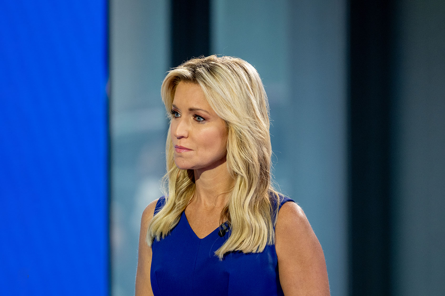 Host Ainsley Earhardt as Lee Brice and Lewis Brice perform on "Fox & Friends" at Fox News Channel studios on August 16, 2023 in New York City. (Roy Rochlin/Getty Images)
