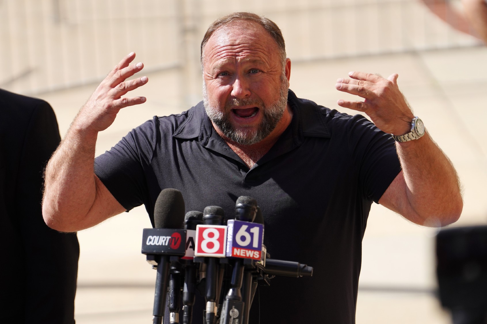 InfoWars founder Alex Jones speaks to the media outside Waterbury Superior Court during his trial on September 21, 2022 in Waterbury, Connecticut. (Joe Buglewicz/Getty Images)