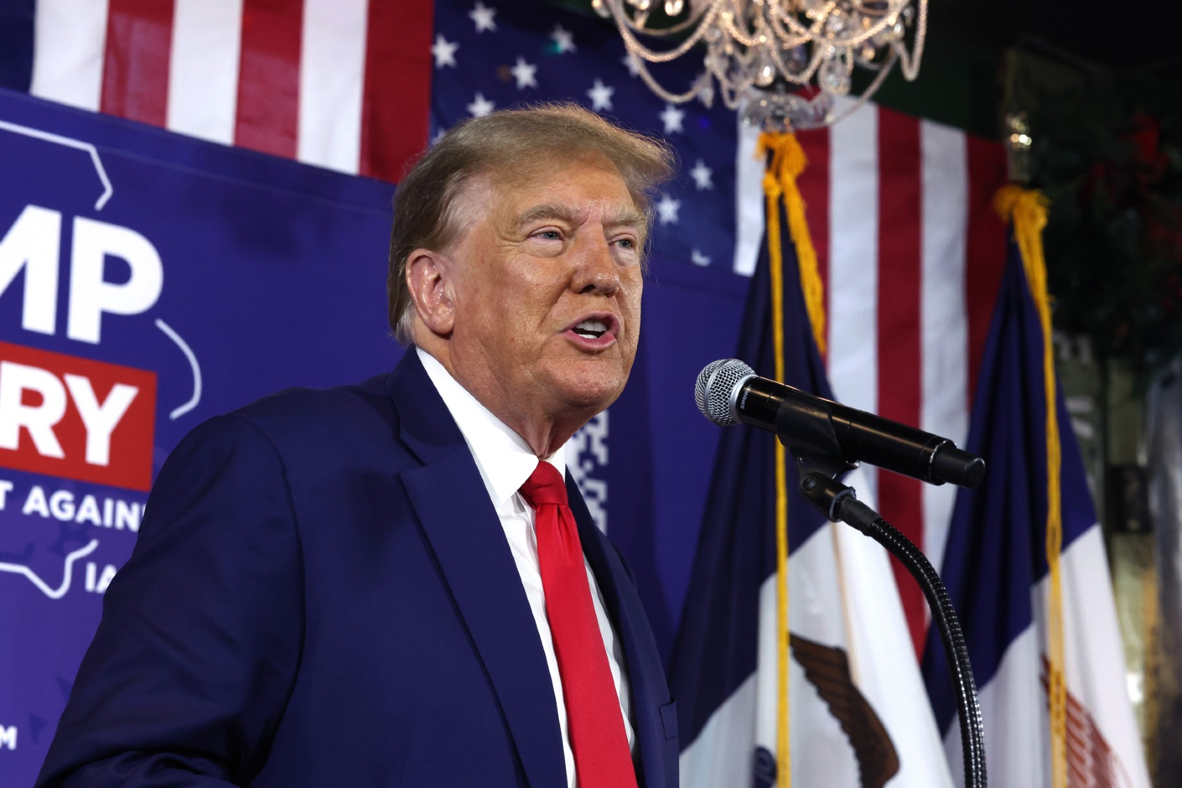 Republican presidential candidate and former President Donald Trump speaks at a commit to caucus campaign event at the Whiskey River bar on December 02, 2023 in Ankeny, Iowa. ( Scott Olson/Getty Images)