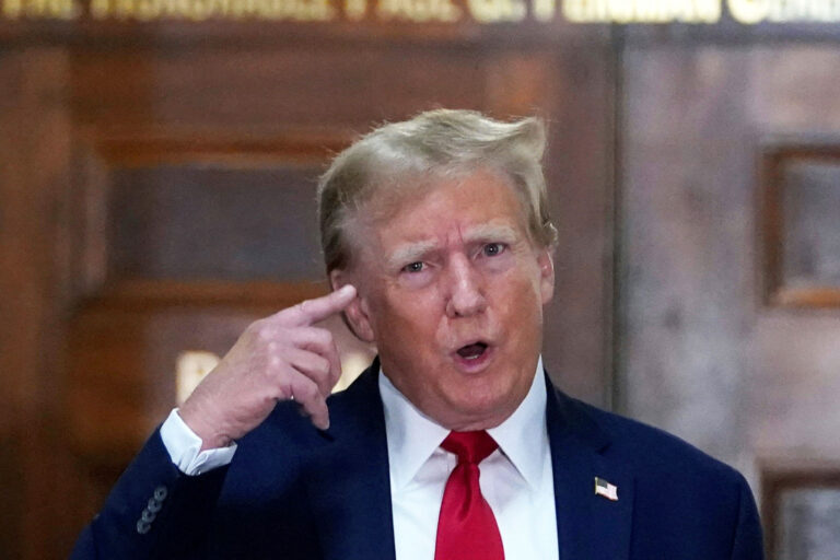 Former US President Donald Trump speaks to members of the media as he arrives at the New York State Supreme Court during the civil fraud trial against the Trump Organization, in New York City on December 7, 2023. (TIMOTHY A. CLARY/AFP via Getty Images)