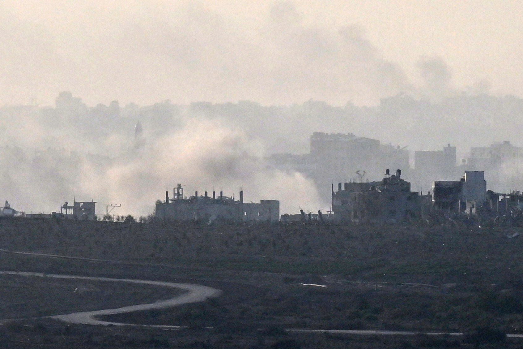 Smoke rises from Northern Gaza after a week long ceasefire ended on December 1, 2023 seen from Sderot, Israel. (Alexi J. Rosenfeld/Getty Images)