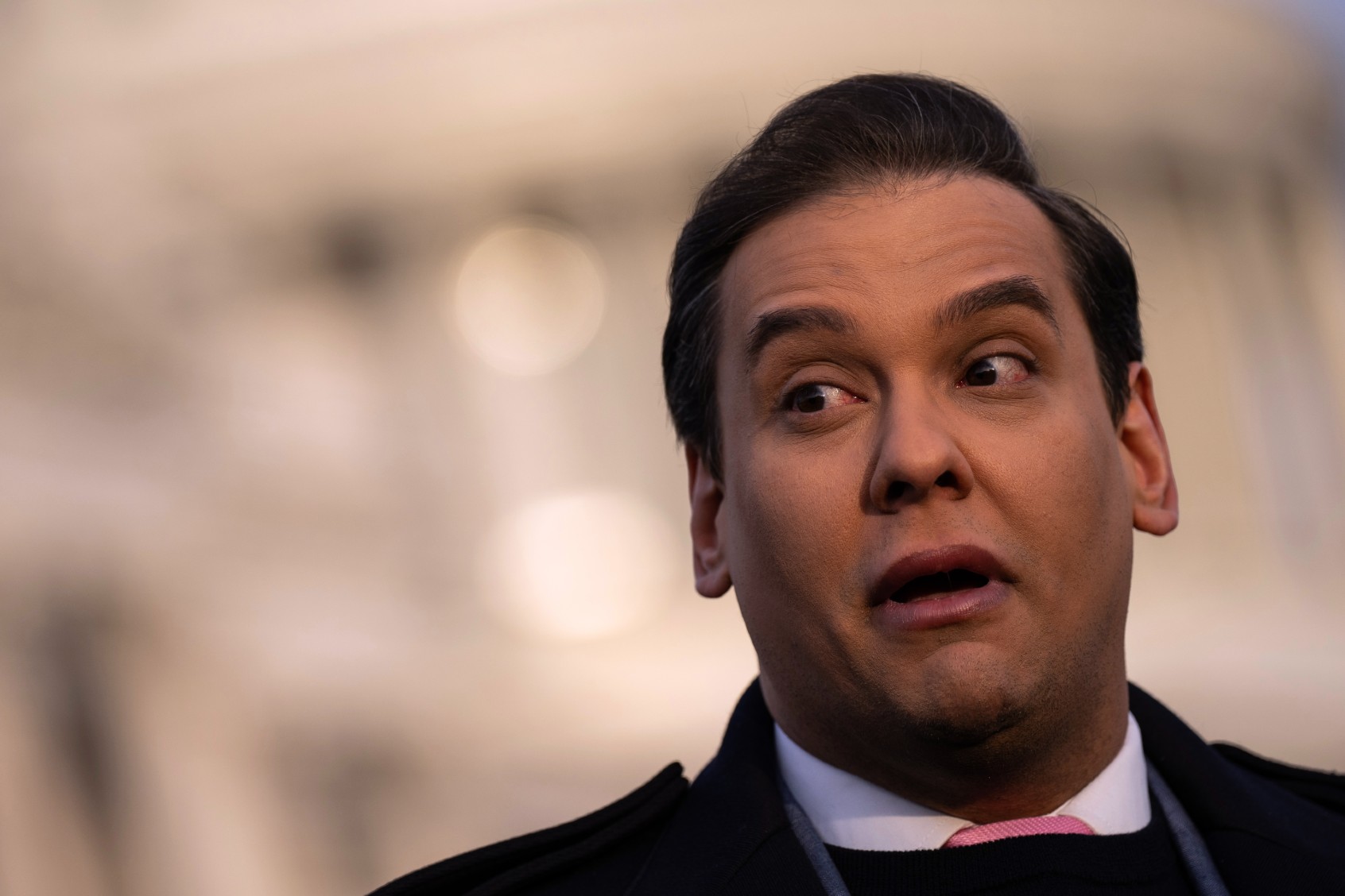 Rep. George Santos (R-NY) talks to reporters outside the U.S. Capitol on November 30, 2023 in Washington, DC. (Drew Angerer/Getty Images)