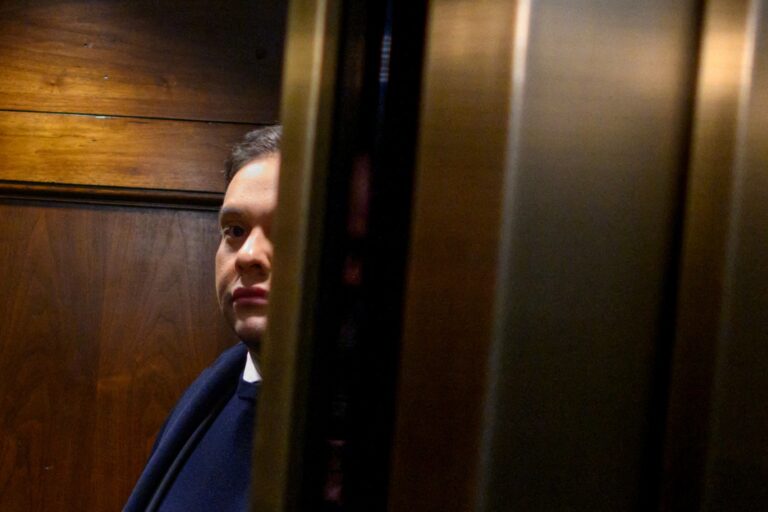 Rep. George Santos, R-NY, takes an elevator while on his way from his office to the US Capitol in Washington, DC, on December 1, 2023. (MANDEL NGAN/AFP via Getty Images)