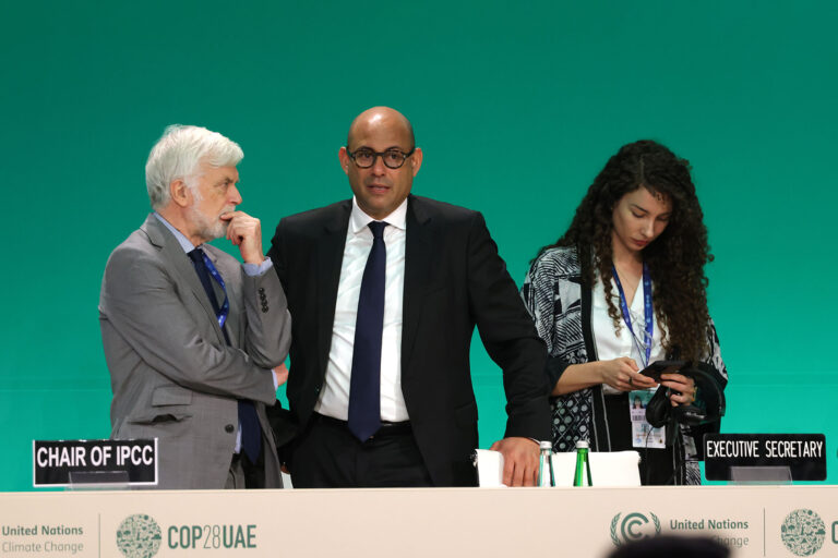 Intergovernmental Panel on Climate Change (IPCC) Chairman Jim Skea (L) speaks with UN Climate Change Executive Secretary Simon Stiell (C) prior to the opening ceremony of the UNFCCC COP28 Climate Conference at Expo City Dubai on November 30, 2023 in Dubai, United Arab Emirates. (Sean Gallup/Getty Images)